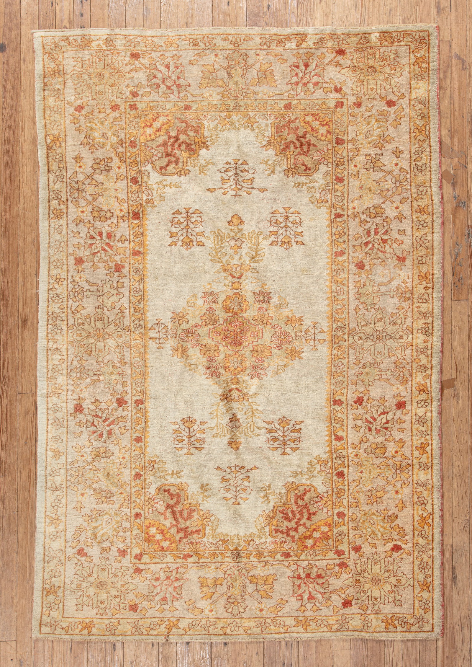 Oushak Carpet: Oushak Carpet , West Anatolia, c. 1900, 6 ft. 5 in. x 9 ft. 10 in., re-piled and/or restored areas one end