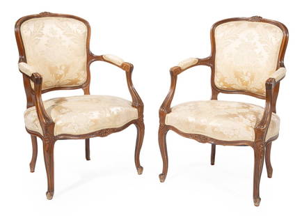 Pair of Louis XV-Style Carved Walnut Fauteuils: Pair of Louis XV-Style Carved Walnut Fauteuils, 20th c., possibly made by Henredon, molded crest rail, padded arms, cabriole legs, h. 34 1/2 in., w. 24 in., d. 23 in.