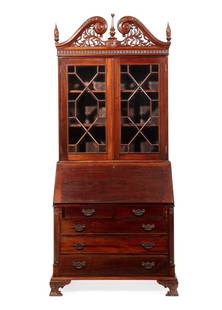 Carved Mahogany Secretary Bookcase: Chippendale-Style Carved Mahogany Secretary Bookcase, 21st c., pierced carved broken arch pediment, center finial, glazed doors, slant front, fitted interior, h. 95 in., w. 42 in., d. 22 in.