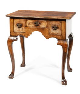 Georgian Inlaid and Banded Walnut Dressing Table: Georgian Inlaid and Banded Walnut Dressing Table, 19th c., molded and banded top, three drawers, shaped apron, cabriole legs, pad foot, h. 29 in., w. 39 in., d. 28 in.