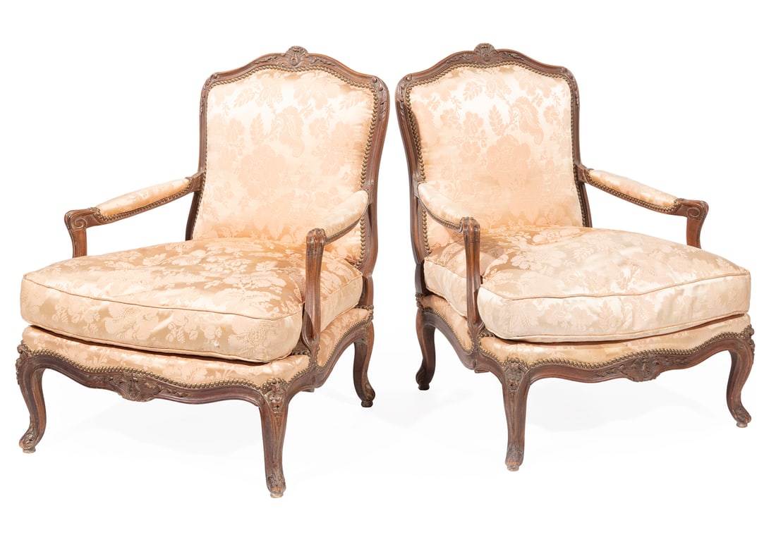 Pair of Louis XV-Style Carved Walnut Bergeres: Pair of Louis XV-Style Carved Walnut Bergeres, 19th c., molded crest rail, padded arms, shaped seat rail, cabriole legs, h. 37 in., w. 28 in., d. 30 in.