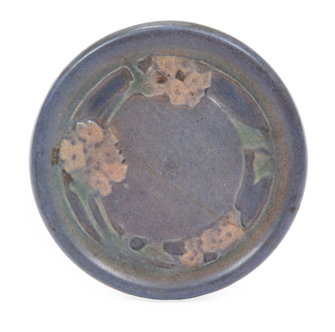 Newcomb College Art Pottery Coaster: Newcomb College Art Pottery Coaster, 1923, designed by Sadie Irvine, matte glaze, floral design, date code NE 28, dia. 4 in., Note: restored