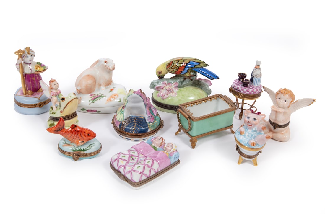 Ten Limoges Porcelain Figural Boxes: Group of Ten Limoges Porcelain Figural Boxes, marked, various forms, incl. fairies, putti, birds, rabbits, fish, frogs, wine and more, tallest h. 4 in.