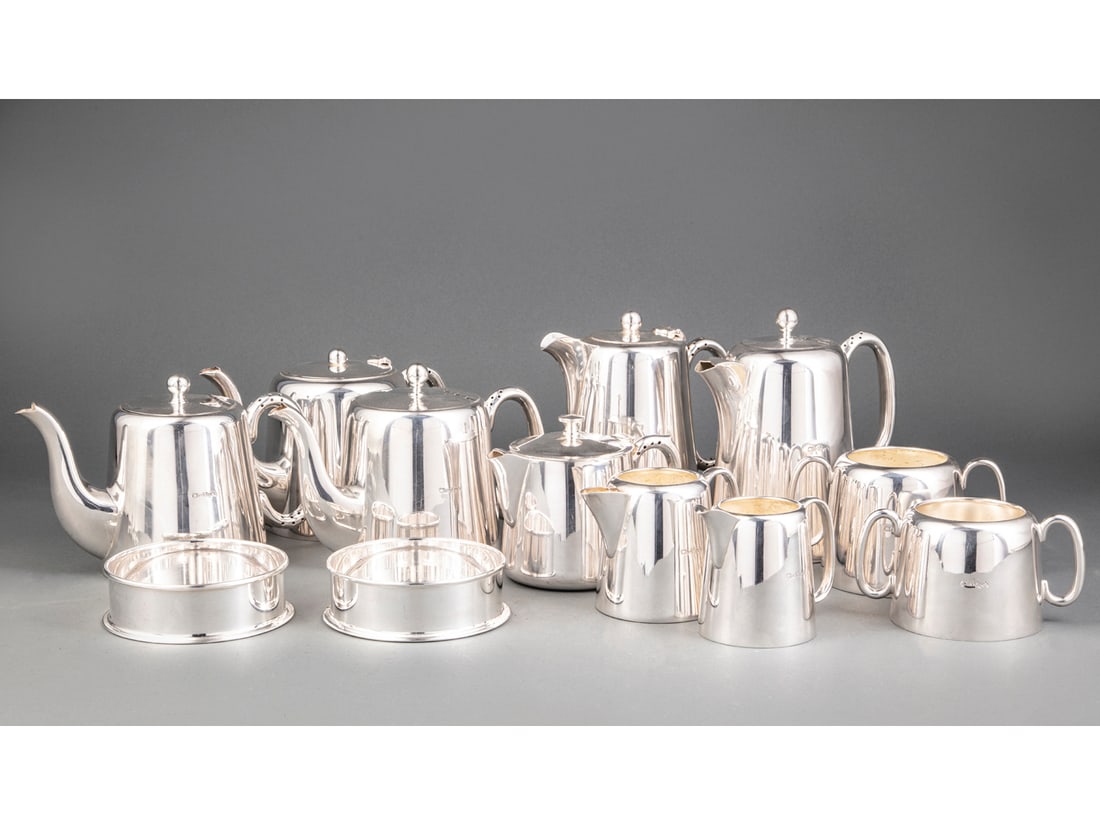 Collectino of Claridge's Hotel Silverplate: Good Collection of Claridge's Hotel Silverplate, incl. 2 coffee pots (h. 7 1/2 in.), 3 teapots (h. 6 in.), hot milk pot (h. 5 in.) wine coasters. (12 pcs.)