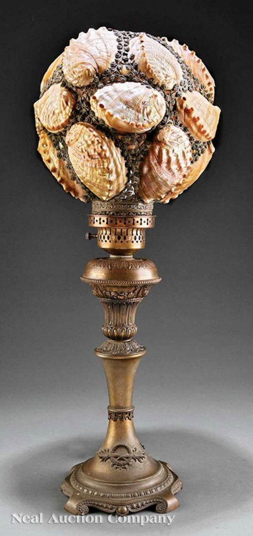 Gilt Metal and Abalone Shell-Mounted Lamp: An Antique American Gilt Metal and Abalone Shell-Mounted Lamp, 19th c., cast flower framework inset with abalone shells, vasiform standard, on scroll feet, now electrified, height 30 in., diameter 12