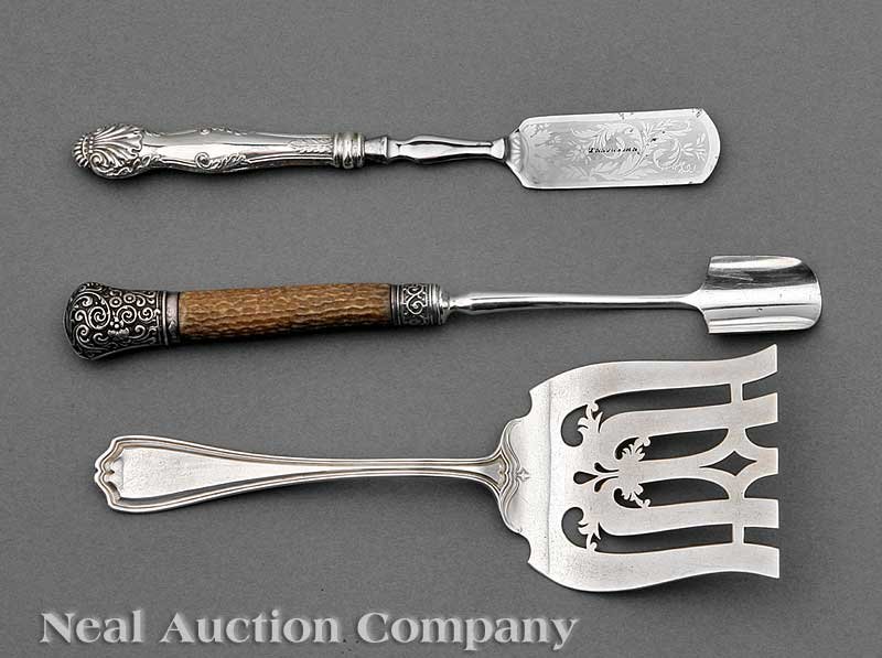 Group of Silver Serving Pieces: A Good Group of Silver Serving Pieces, including a sterling silver asparagus fork, Reed & Barton, Taunton, MA, 1840 to present, "Hepplewhite" pattern, pat. 1907; a sterling silver soup ladle, Simpson,