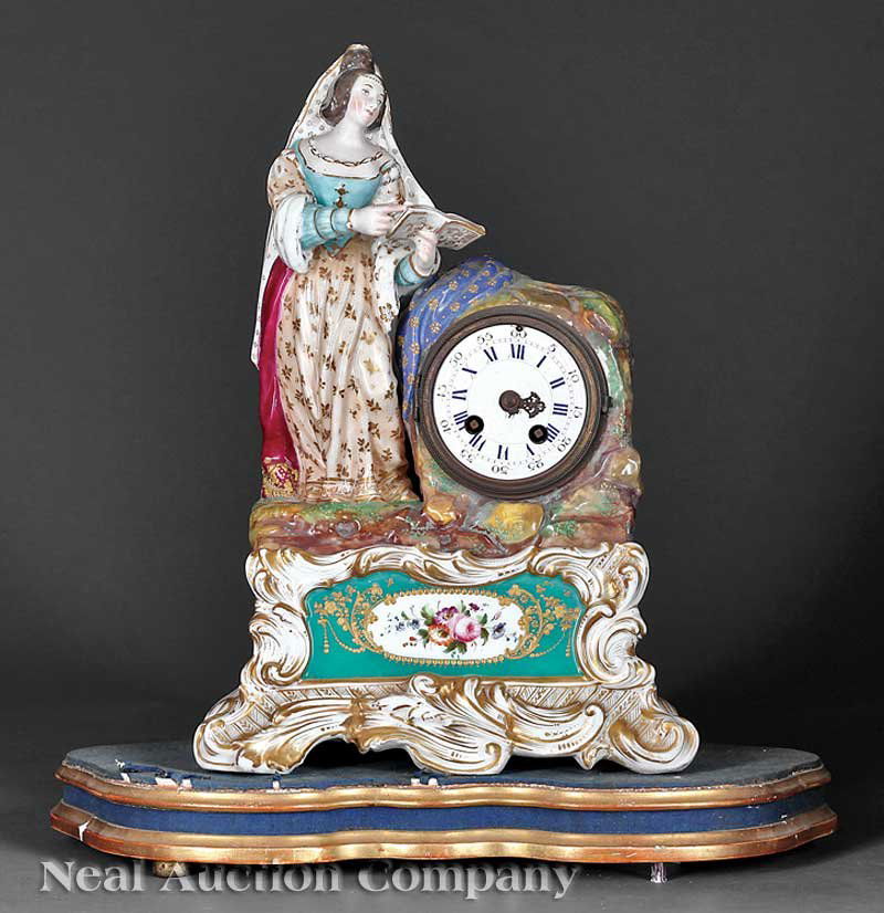 Paris Porcelain Gilt and Polychrome Mantel Clock: A Paris Porcelain Gilt and Polychrome Mantel Clock, late 19th c., in the style of Jacob Petit, the figure singing from song book, scrolled base with floral reserve, with later wood base, height 13 1/2