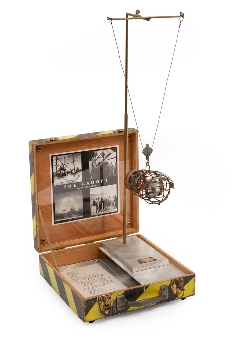 Thomas Mann (American/Louisiana, b. 1947): Thomas Mann (American/Louisiana, b. 1947), "The Gadget", 1999, mixed media sculpture, signed, titled, dated and stamped on plaque, presented on a stand with painted case, h. 29 in., w. 12 3/4 in., d.