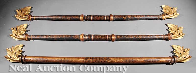 American Classical Gilt, Stenciled Cornice Rods: A Fine Pair of American Classical Gilt and Stenciled Cornice Rods, 19th c., black ground, ending in carved foliage; together with a gilt ground cornice rod, height 8 in., length 74 in., depth 2 1/4 in