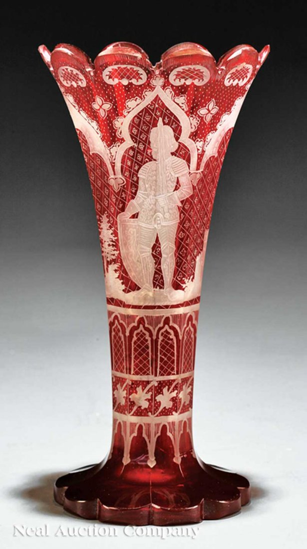 Bohemian Gothic Ruby Cut-to-Clear Glass Vase: A Fine Bohemian Gothic Ruby Cut-to-Clear Glass Vase, late 19th c., with standing knight and trophy, lobed rim and foot, height 10 1/4 in