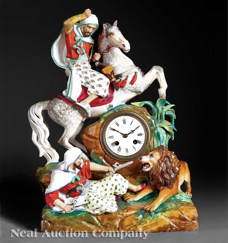 Paris Porcelain Figural Mantel Clock, prob. Petit: A Paris Porcelain Figural Mantel Clock, c. 1860, probably Jacob Petit, the relief-ornamented and polychromed case modeled as desert tribesmen hunting a lion, movement by L. Marti & Cie, Paris, height