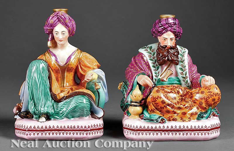Jacob Petit Porcelain Scent Bottles: A Good Pair of Jacob Petit Porcelain Scent Bottles, c. 1850, marked "JP", modeled as a Turkish prince and princess, seated on cushions, height 7 1/4 in., width 5 1/2 in., depth 4 1/2 in