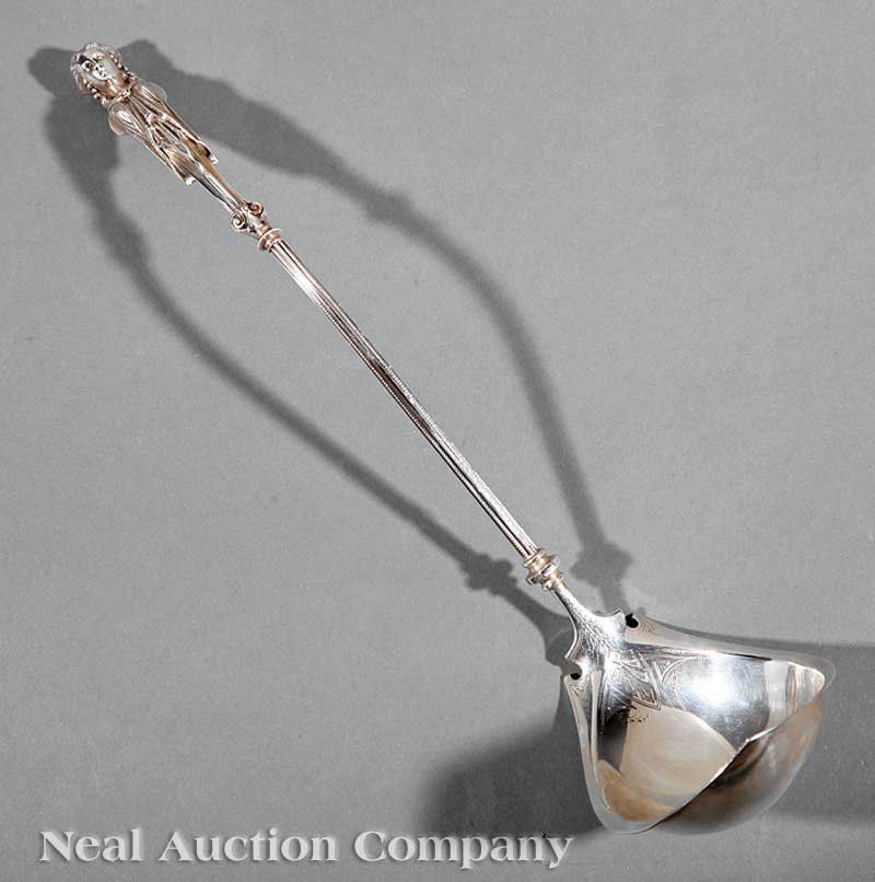 George Sharp Coin Silver Punch Ladle: An American Coin Silver Punch Ladle in the Neo-Grec Taste, George Sharp, Philadelphia, wc. 1850-1874, marked with Sharp's lion/S/lion trademark, and with 1866 patent date, length 15 1/2 in., weight 9.