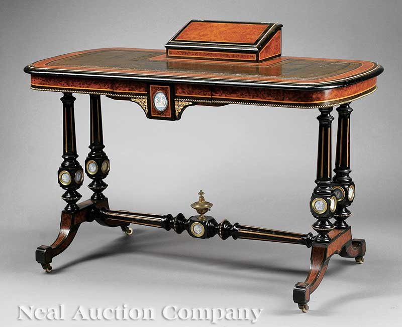 Inlaid, Ebonized and Burlwood Writing Table: A Fine English Inlaid, Ebonized and Burlwood Writing Table, mid-19th c., London, neoclassical "Wedgwood" roundels throughout, fitted desk box mounted above tooled leather top, concealed frieze drawer,