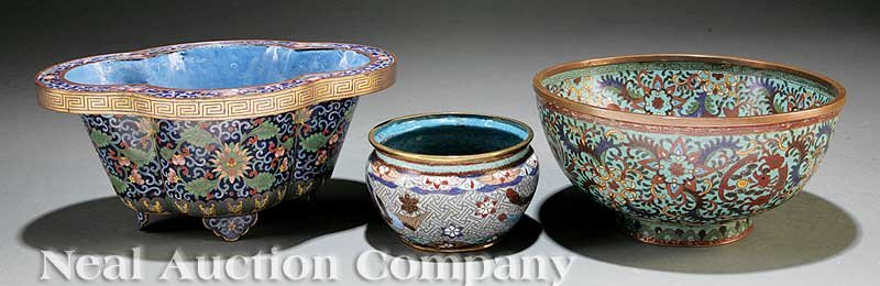 Three Asian Cloisonne Enamel Vessels: A Group of Three Asian Cloisonne Enamel Vessels, late 19th/20th c., including a quadrilobe footed jardiniere, height 4 1/2 in., width 10 in., depth 7 in., a waisted neck small bowl and a larger bowl, 