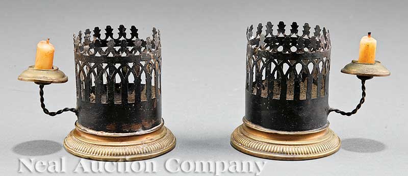 Gothic Gilt Metal, Steel Chamber Candlesticks: A Pair of French Gothic Gilt Metal and Steel Chamber Candlesticks, 19th c., the gallery issuing another smaller candlestick, height 3 in., diameter 3 in