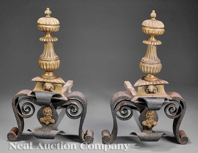 Renaissance Revival Brass and Iron Andirons: A Pair of Renaissance Revival Brass and Iron Andirons, 19th c., probably Spanish, lion masque finial on ribbed suppressed ball and baluster shaft, scrolled hand-wrought iron base, billet bars, height