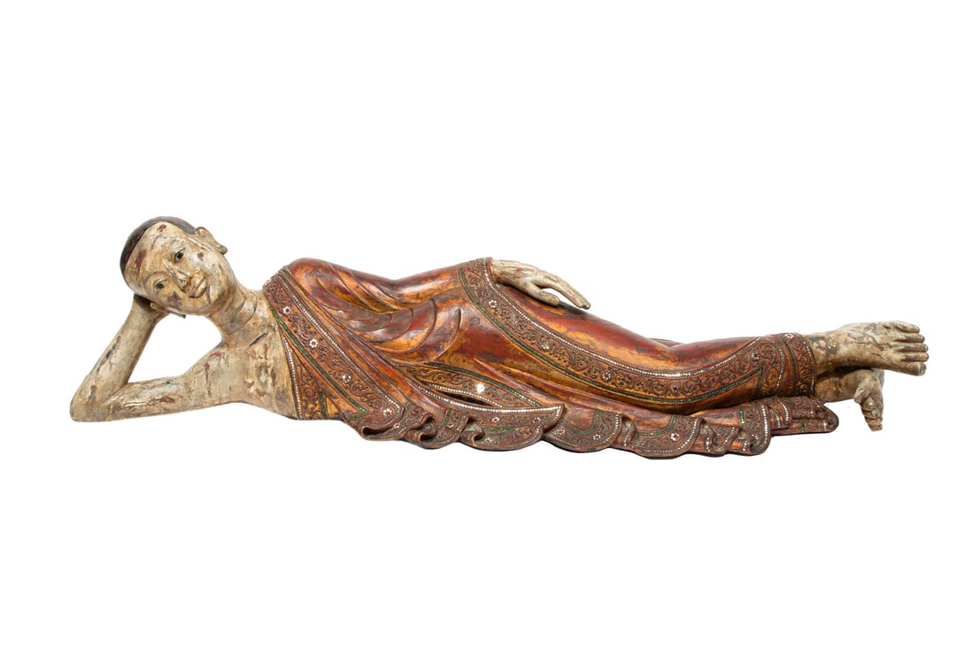 Southeast Asian Carved, Gilded Buddha: Monumental Southeast Asian Carved, Gilded and Glass Gem Embellished Figure of Reclining Buddha, l. 59 in.