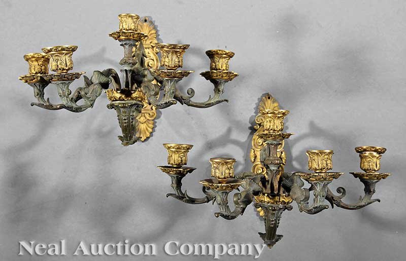 Gilt and Patinated Bronze Five-Light Sconces: A Pair of Louis Philippe Gilt and Patinated Bronze Five-Light Sconces, c. 1850, scroll and palmette backplate, issuing foliate candle supports, not electrified, height 12 in., width 14 1/2 in., depth 