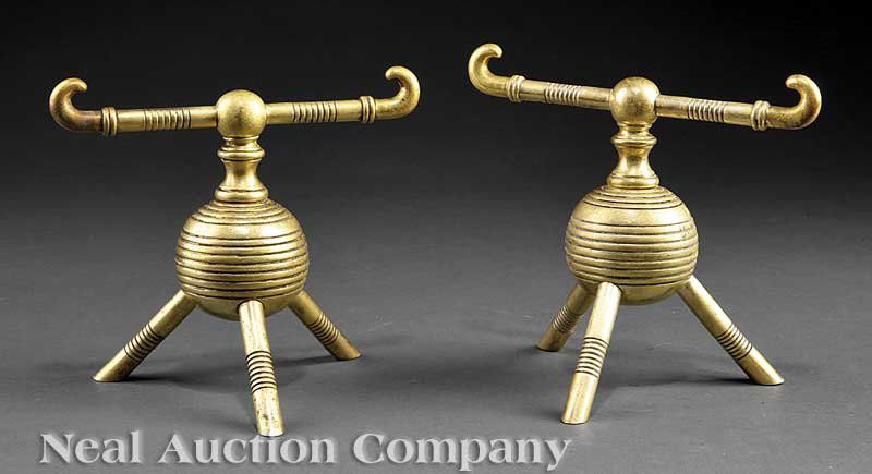 Brass Fire Dogs attr. Benham & Froud: A Pair of English Arts and Crafts Brass Fire Dogs, c. 1885, attributed to Benham & Froud, London, wc. 1855-1924, from a design by Christopher Dresser, each spherule ribbed body on cylindrical legs and