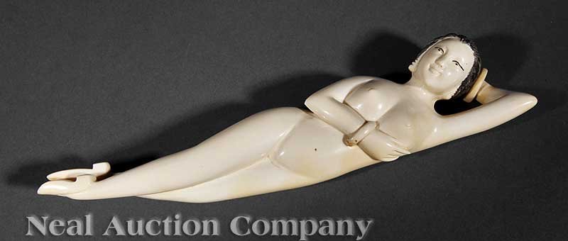 A Chinese Ivory Doctor's Lady: A Chinese Ivory Doctor's Lady, elegant reclining nude carved wearing earrings, bracelets and shoes, length 8 1/2 in Provenance: Mobile, AL Collection.