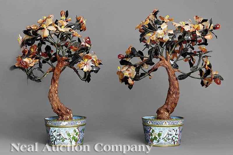 A Pair of Chinese Hardstone Trees: A Pair of Chinese Hardstone Trees Set in Cloisonne Enamel Pots, each with naturalistic "bark" trunks, fabric wrapped branches and multi-colored hardstone leaves and blossoms raised in circular cloison