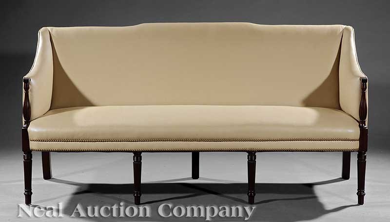 American Federal-Style Mahogany Sofa: An Antique American Federal-Style Carved Mahogany Sofa, reeded uprights and legs, brass nailhead trim, height 36 in., width 73 in., depth 30 in