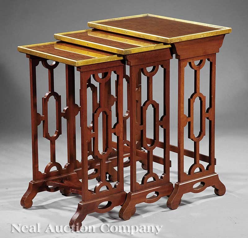 A Set of Three Regency Mahogany Nesting Tables: A Set of Three Regency Mahogany Nesting Tables, 19th c., openwork trestle supports, height 27 1/2 in., width 20 in., depth 13 in