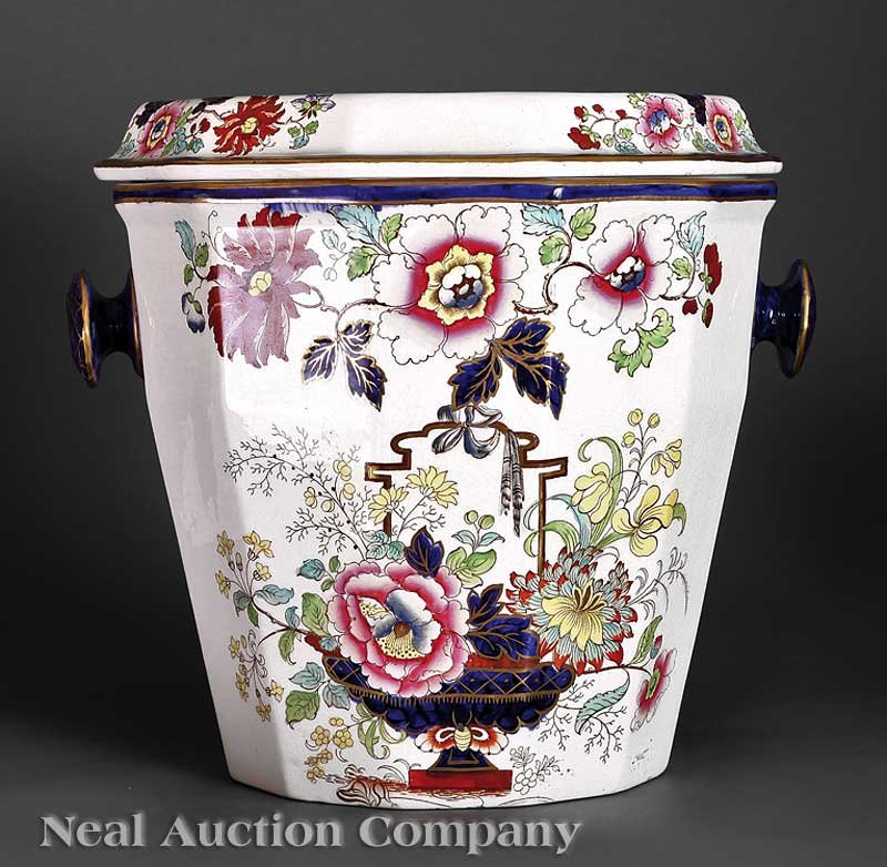 A Mason's Ironstone "Imari" Chamber Pot: An Antique Mason's Ironstone "Imari" Palette Chamber Pot, marked, faceted tapering bucket-form body with circular handles, inset with pierced bowl, height 12 3/4 in., width 15 1/2 in. Provenance: Esta