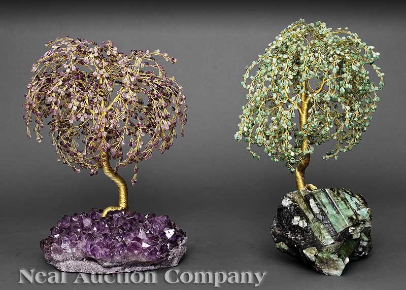 Two Brazilian "Gemstone" Trees: Two Brazilian "Gemstone" Trees, naturalistic rock bases issuing gilt metal wrapped trunks and branches with tumbled "gemstone" leaves, one emerald quartz, the other amethystine quartz, height 13 1/4 i