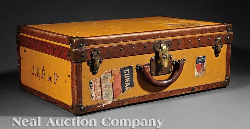 A Louis Vuitton Suitcase: A Vintage Louis Vuitton Suitcase, c. 1940, serial# 748896, leather trim, with "LV" stamped logo, lockplates marked, interior with removable tray, bears remnants of old ocean liner labels and painted m