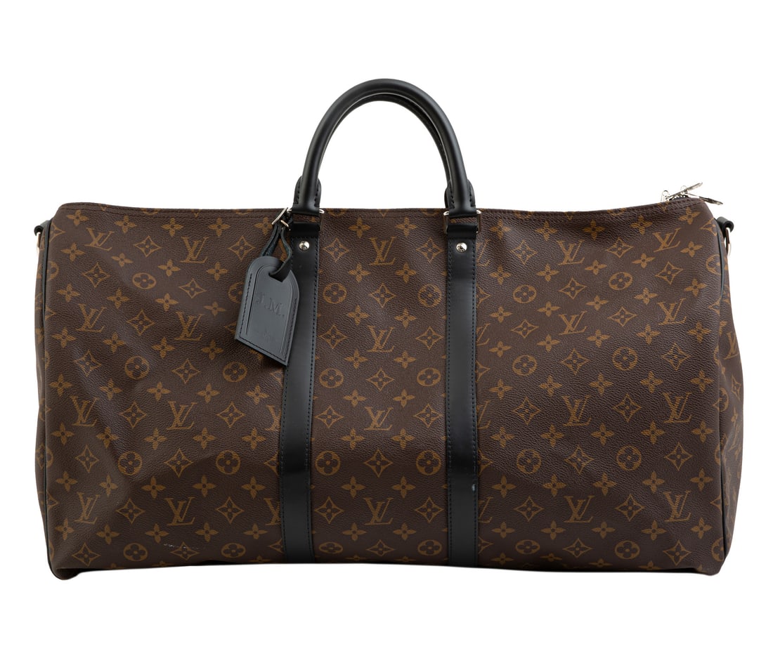 Louis Vuitton Keepall Bandouli?re 45 in Brown Monogram Coated Canvas with Black Leather Trim , h. 1: , silver-tone metal hardware, cotton textile lining, removable leather luggage tag, h. 1 3/4 in., w. 17 3/4 in., d. 7 3/4 in.; removable adjustable strap, drop h. max 20 in.;
