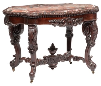 American Rococo Carved Mahogany Turtle Top Center Table h. 31 in., l. 44 1/2 in., w. 31 in.