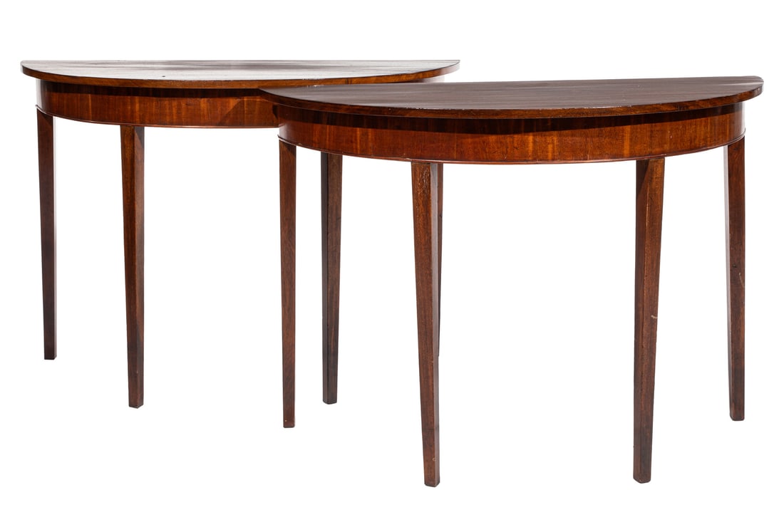 Pair of Georgian Carved Mahogany Demilune Consoles h. 33 1/4 in., w. 48 in., d. 21 1/2 in.: Pair of Georgian Carved Mahogany Demilune Consoles , 19th c., molded conforming frieze, square tapered legs, h. 33 1/4 in., w. 48 in., d. 21 1/2 in. h. 33 1/4 in., w. 48 in., d. 21 1/2 in.