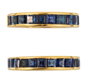 Two 18 kt. Yellow Gold and Sapphire Band Rings