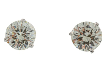 Pair of 14 kt. White Gold and Diamond Stud Earrings