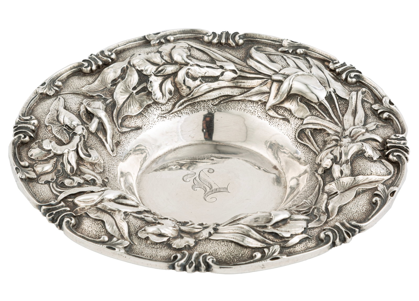 Antique American Sterling Silver Bowl, h. 1 1/2 in., dia. 7 1/8 in., weight 7.80 troy ozs.: Antique American Sterling Silver Bowl, late 19th/early 20th c., wide molded border cast with calla lilies and irises with foliage on stippled ground, h. 1 1/2 in., dia. 7 1/8 in., weight 7.80 troy ozs