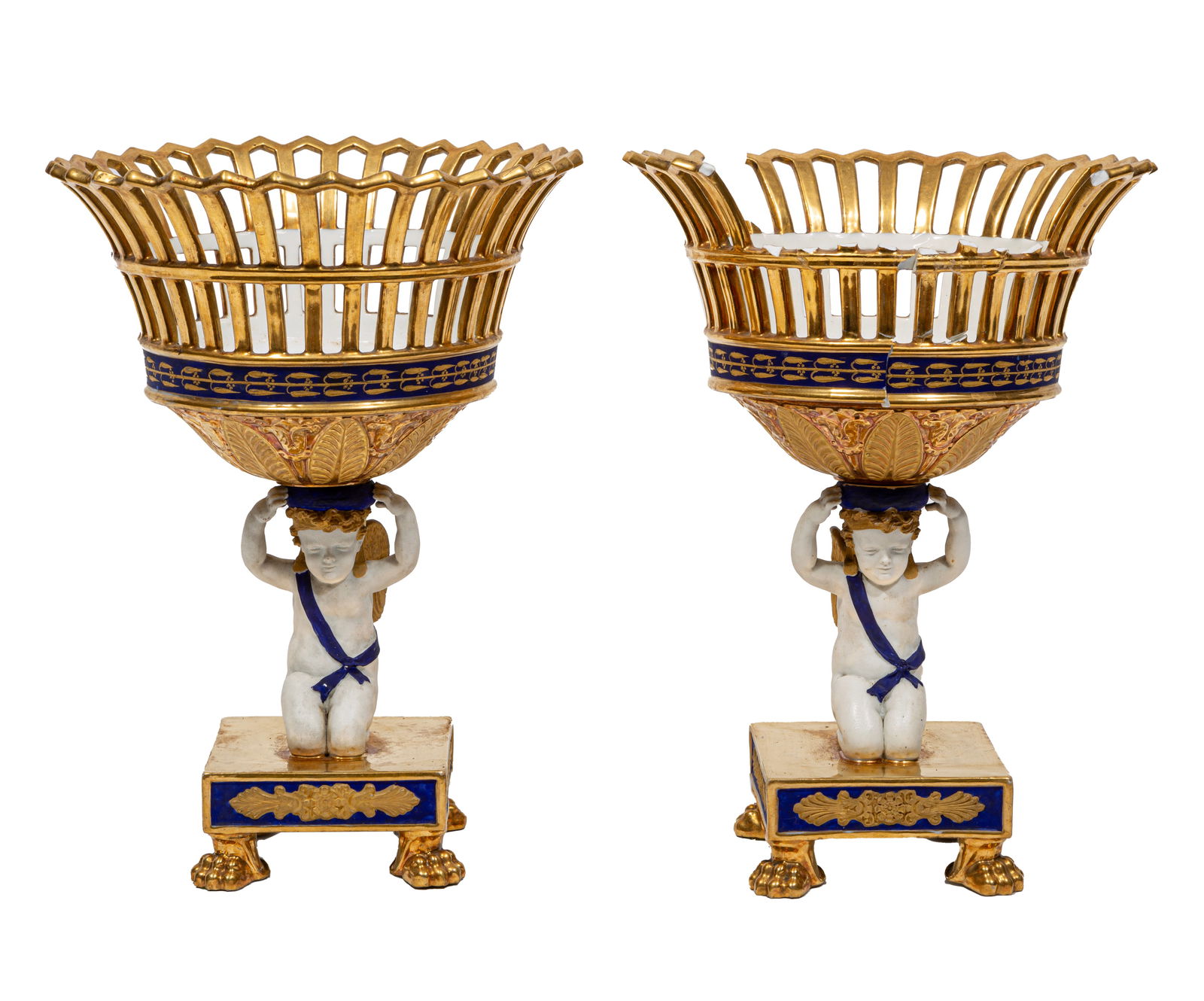 Pair of Paris Porcelain Bleu, Gilt and Bisque Corbeilles 12 x 9 in. (30.5 x 22.9 cm.): Pair of Paris Porcelain Bleu, Gilt and Bisque Corbeilles19th c., putto standard, paw feet, one as-is, with major losses12 x 9 in. (30.5 x 22.9 cm.)