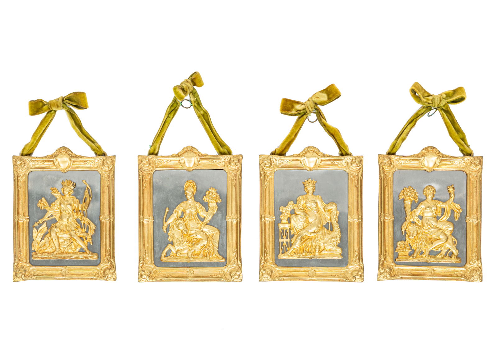 Four Empire Bronze Relief Furniture Mounts of the Four Continents: Four Empire Bronze Relief Furniture Mounts of the Four Continents, early 19th c., now mounted and framedHeight -- 5 3/4 in., Width -- 4 1/2 in.