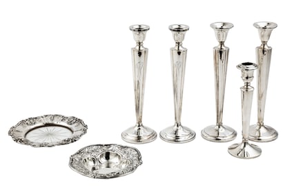 Group of American Sterling Silver, 20th c., incl. set of 4 weighted candlesticks (h. 10 in.), single