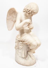 Carved Marble Figure of Angel with Butterfly 32 1/2 x 14 1/2 x 18 1/2 in. (82.6 x 36.8 x 47 cm.)