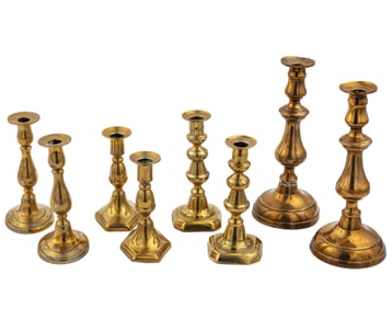 Four Pairs of English Turned Brass Candlesticks