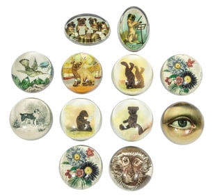 Twelve John Derian Decoupage Glass Dome Paperweights