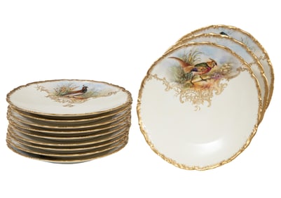 Set of Twelve Limoges Gilt and Polychrome Porcelain "Game Bird" Plates