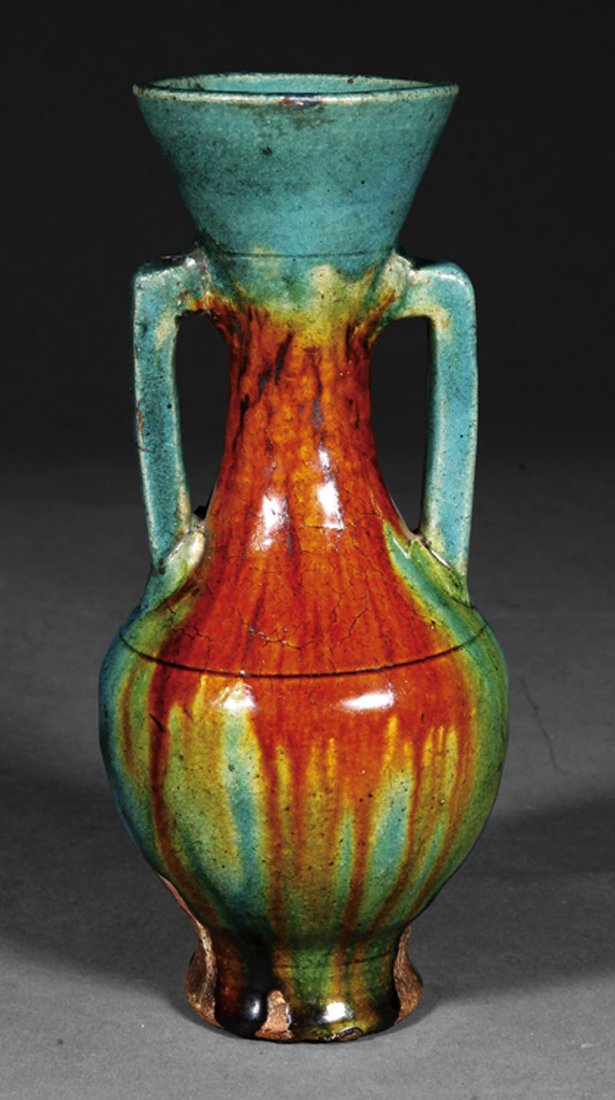 Middle Eastern Glazed Stoneware Amphora Vase: An Antique Middle Eastern Glazed Stoneware Amphora Vase, turquoise, iron and yellow glaze pooling toward the unglazed foot, height 7 3/4 in Provenance: The Headley-Whitney Museum, Lexington, KY.