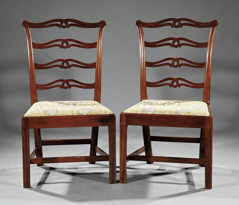 Carved Walnut Ladder or Slat-Back Side Chairs: Two American Chippendale-Style Carved Walnut Ladder or Slat-Back Side Chairs, in the Philadelphia style, molded tapered stiles, molded seat rails, fluted square legs, stretchers. Note: Name inscribed 