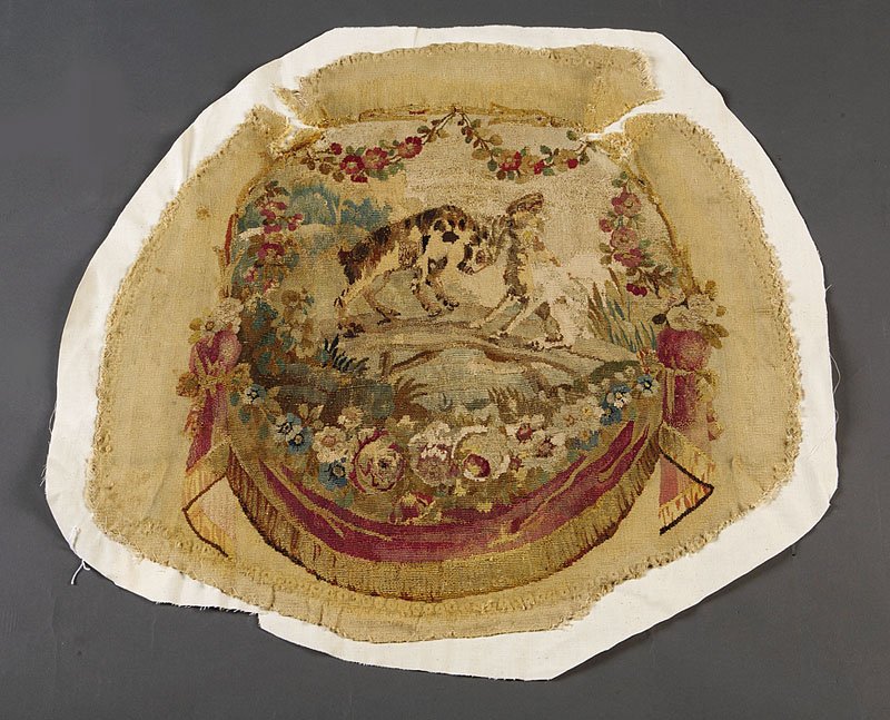 French Aubusson Wool Chair Seat Covers: A Pair of French Aubusson Wool Chair Seat Covers, 18th c., tapestry with floral garlands and fringed swag reserved with depictions of Aesop's Fables of The Fox and The Stork and The Two Goats, profess