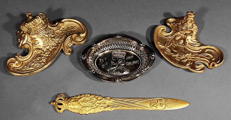 [Mardi Gras] Rex Ball Favors: [Mardi Gras], four Rex ball favors, including a 1908 pen tray, 1911 inkwell with glass insert, a 1910 letter opener and 1913 dresser tray