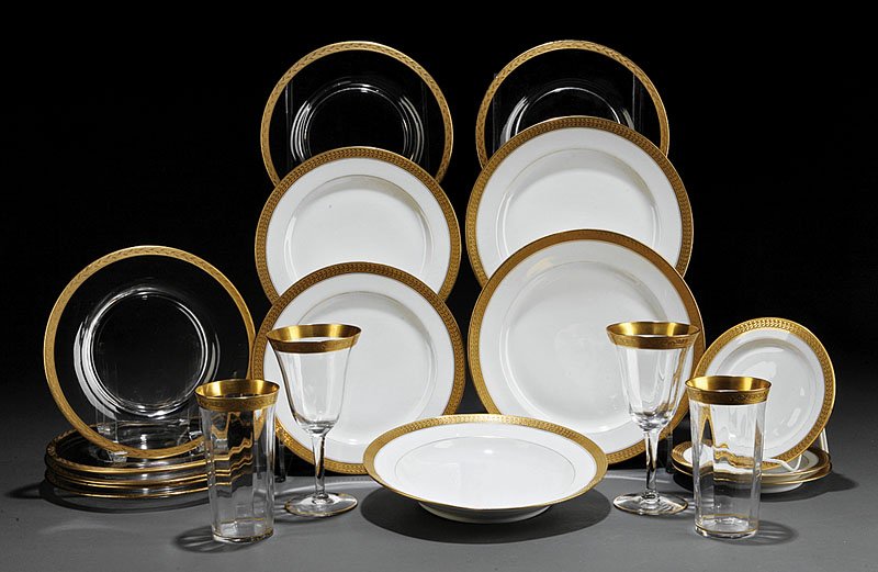 French Porcelain Dinner Service ret. E. Offner: A French Porcelain Dinner Service, ret. E. Offner, New Orleans, comprising 8 soup bowls, 8 dinner plates, 8 salad plates, 8 bread and butter plates, 10 wine glasses and 8 juice glasses