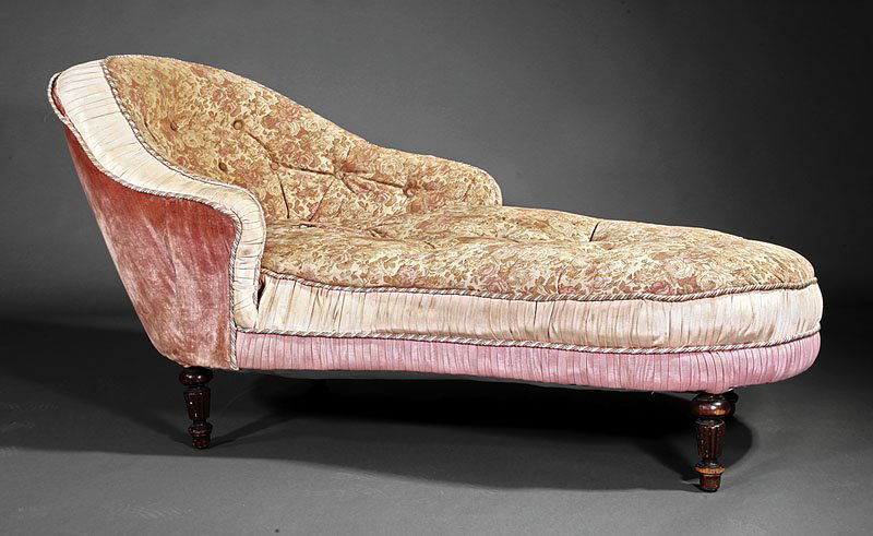"Turkish" Chaise: A "Turkish" Chaise, late 19th c., upholstered back and low arm, rounded foot on fluted turned legs, height 32 in., length 66 in., width 34 1/2 in